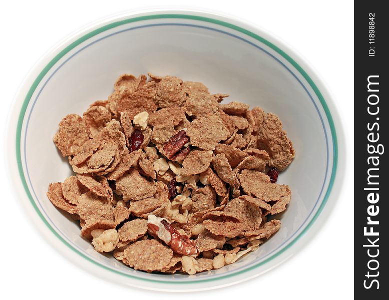 Single serving of multi-grain breakfast cereal with nuts in a bowl. Single serving of multi-grain breakfast cereal with nuts in a bowl