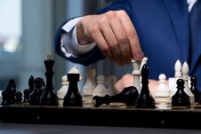 The Businessman Playing Chess In Strategy Concept Stock Photo The Businessman Playing Chess In Strategy Concept Stock Photo