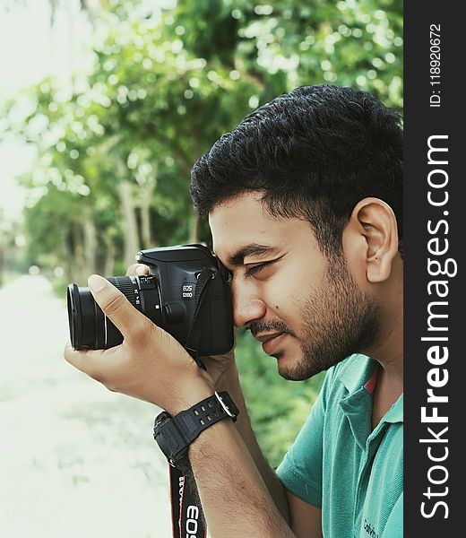 Man Using Canon Eos Camera