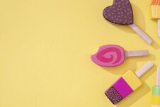 Ice Cream Popsicles Lollipops On A Pastel Yellow Background Stock Images