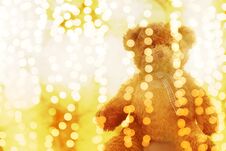 Teddy Bear Doll In Lighting Line Bokeh Gold Bright For Christmas Or Happy New Year Background, Bear In Glitter Gold Yellow Royalty Free Stock Images