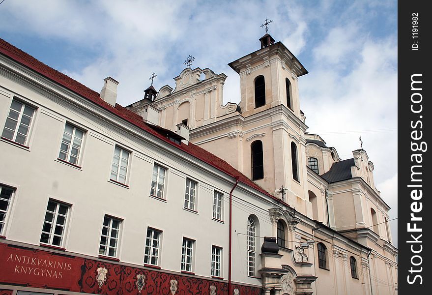 Old book store in fhe foreground and a monastery in the background