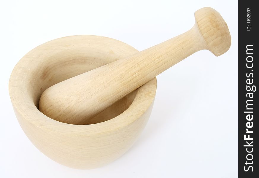 Female hand grinding the mortar and pestle, over white, macro closeup, close-up with copy space. Female hand grinding the mortar and pestle, over white, macro closeup, close-up with copy space.