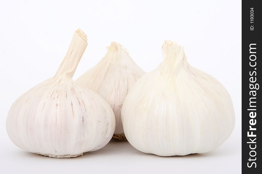 Garlic cloves, macro close up isolated on white, close-up, with copy space