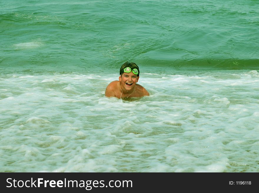 The teenager bathe in the sea