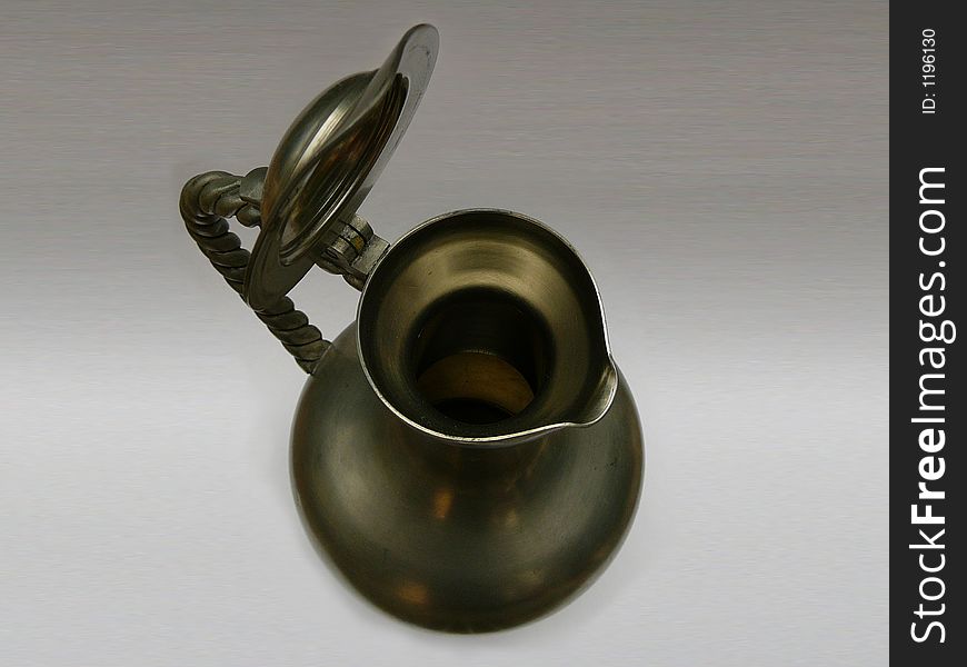 Antique tin pitcher. Seen from above. It's an traditional pitcher from Germany. This type was used to pour wine.