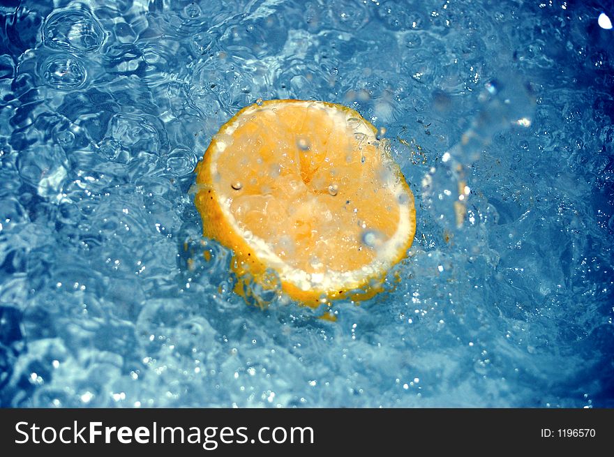 Fresh lemon under blue water. Fresh lemon under blue water