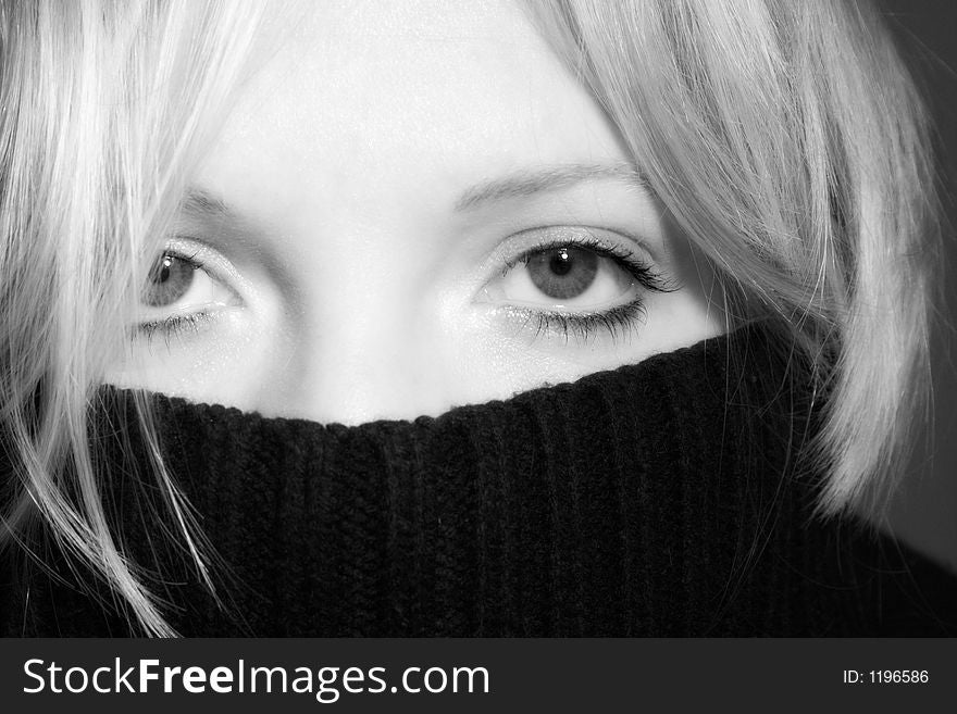 Close up of a woman behind a pullover. Close up of a woman behind a pullover