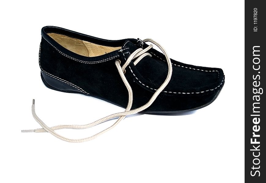 One black leather woman shoe. One black leather woman shoe