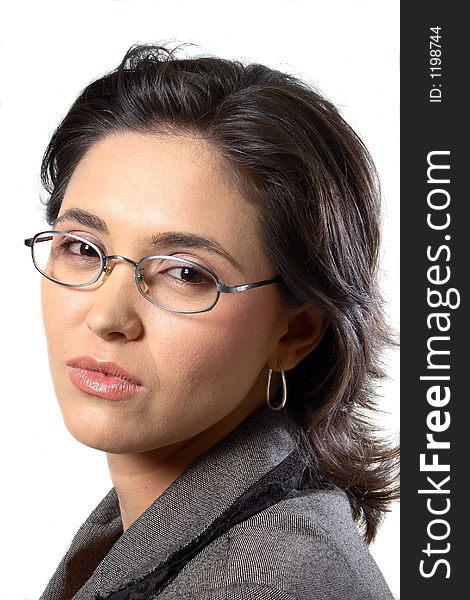 Closeup of business woman with glasses looking at camera. Closeup of business woman with glasses looking at camera