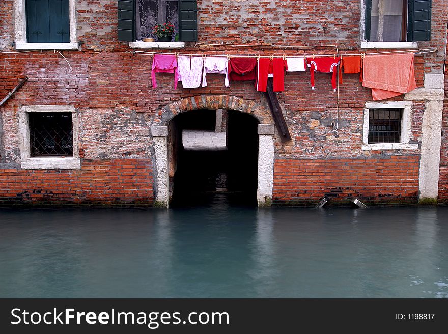 Washing hanging out, in one of the many small canals that makes up the beauty of Venice. Washing hanging out, in one of the many small canals that makes up the beauty of Venice.