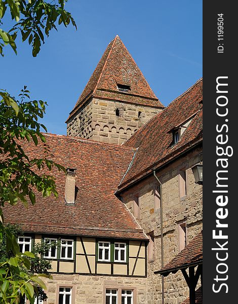 These houses and towers at Maulbronn Abbey compound in Germany are built next to the old town wall. These houses and towers at Maulbronn Abbey compound in Germany are built next to the old town wall.