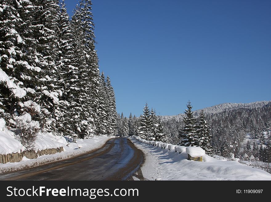 Road crossing the mountains  in winter. Road crossing the mountains  in winter