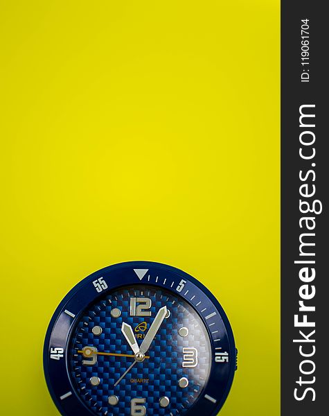 Closeup Photo Of Round Blue Analog Watch