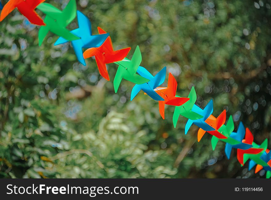 Selective Focus Photography of Pinwheels on String