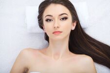 Body Care. Face Massage. Beautiful Young Woman Relaxing With Han Stock Photo
