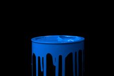 Blue Paint Flowing Over The Wall Of Empty Metal Bucket. Isolated Royalty Free Stock Image