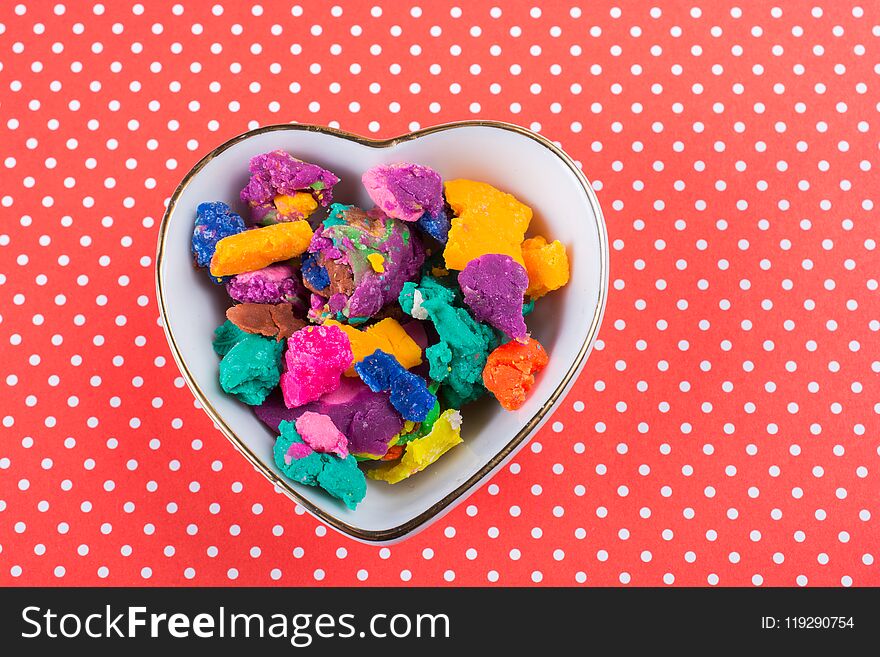 Dry colorful play dough in smal pieces. Dry colorful play dough in smal pieces