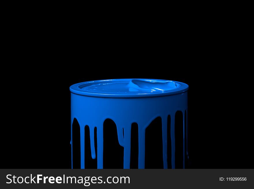 Blue Paint Flowing Over The Wall Of Empty Metal Bucket. Isolated