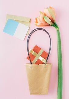 Creative Layout Amaryllis Flower Paper Bag Red Gift Box Envelope Stock Photography