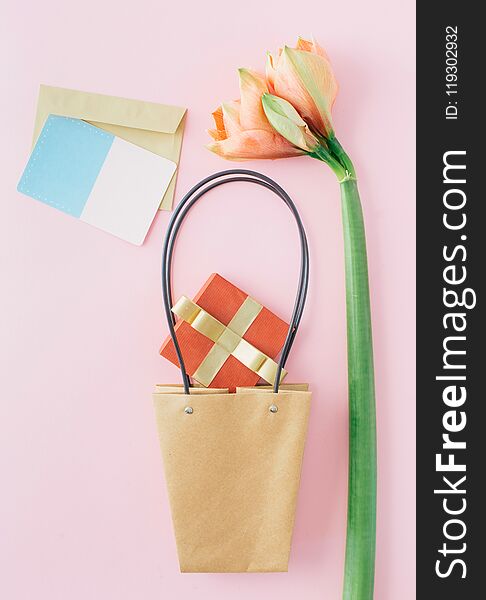Creative layout amaryllis flower paper bag red gift box envelope