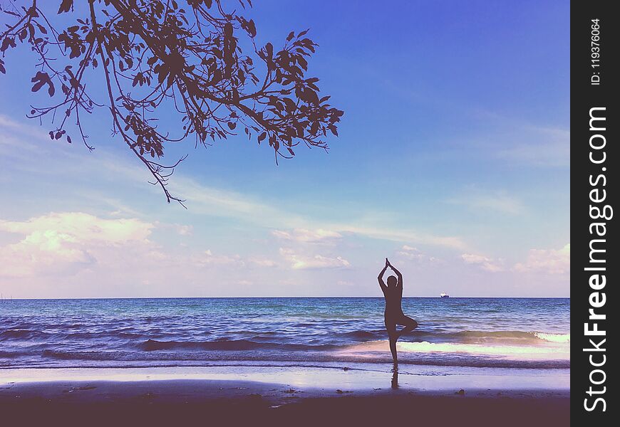 A yogie and the seaview, beach waves. A yogie and the seaview, beach waves