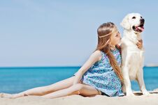 Young Girl With Her Dog By Seaside Stock Images