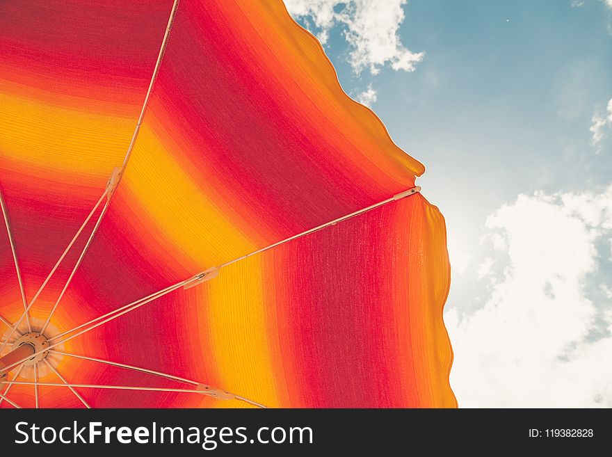 Low Angle Photo of Red and Orange Umbrella