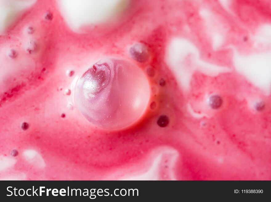 Close up texture of sour cream sauce and cherry juice. Close up texture of sour cream sauce and cherry juice