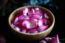 Close-up Macro Photo Of Rose Petals In A Wooden Bowl Stock Images