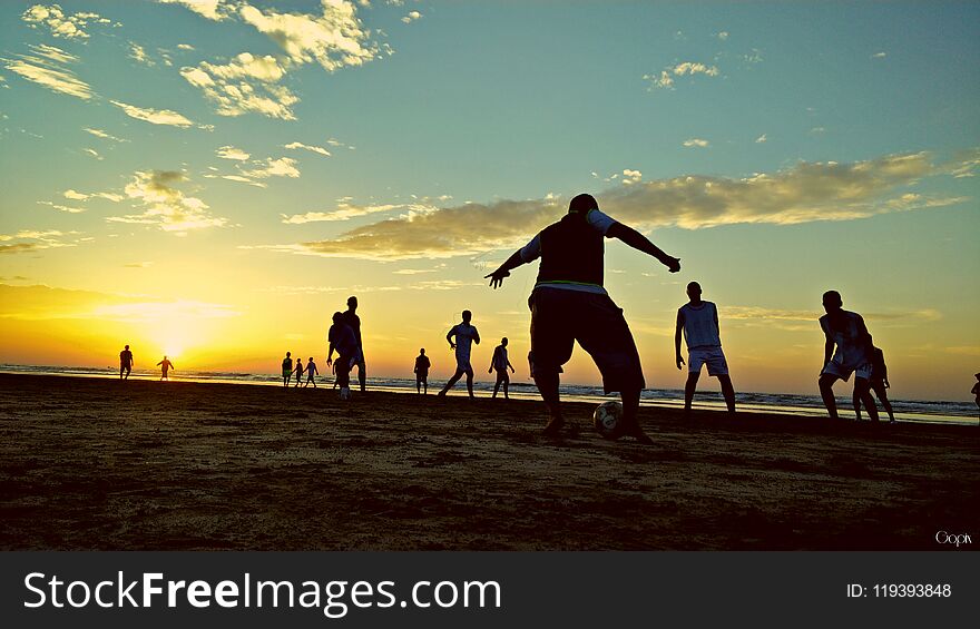 Foot ball fans playing at the beach world cup fever. Foot ball fans playing at the beach world cup fever