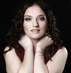 Portrait Of Beautiful Woman In Red Dress Posing For The Camera Stock Photos