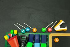 Closeup Of Colorful School Supplies With Copy Space On Blackboard Background. Back To School. Stock Image