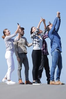 Rear View. Happy Friends Doing A Selfie. Stock Photos Rear View. Happy Friends Doing A Selfie. Stock Photos
