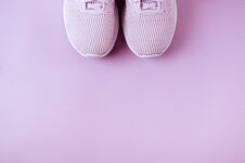 Violet Sneakers Pink Background. Royalty Free Stock Images