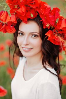 Beautiful Girl In Red Poppy Field Royalty Free Stock Photography