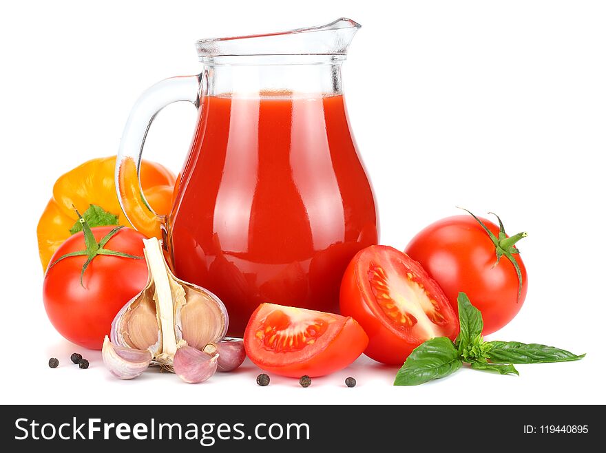 Tomato Juice In Glass Jug With Tomato, Garlic, Spices, And Basil Isolated On White Background