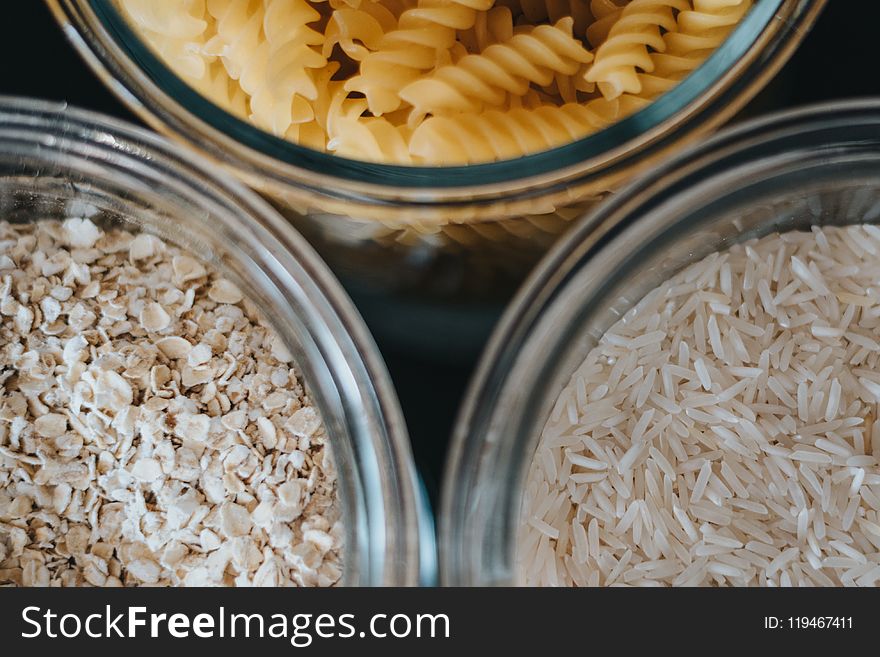 Three Clear Glass Jars With Cereals