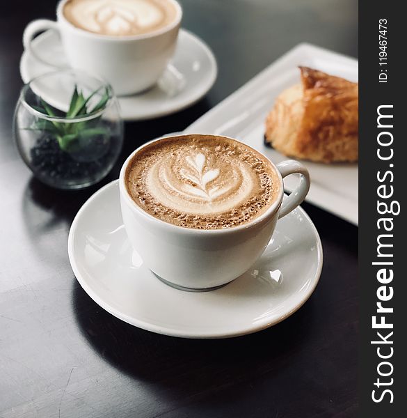 Selective Focus Photo Of White Ceramic Mug On Saucer Filled With Espresso