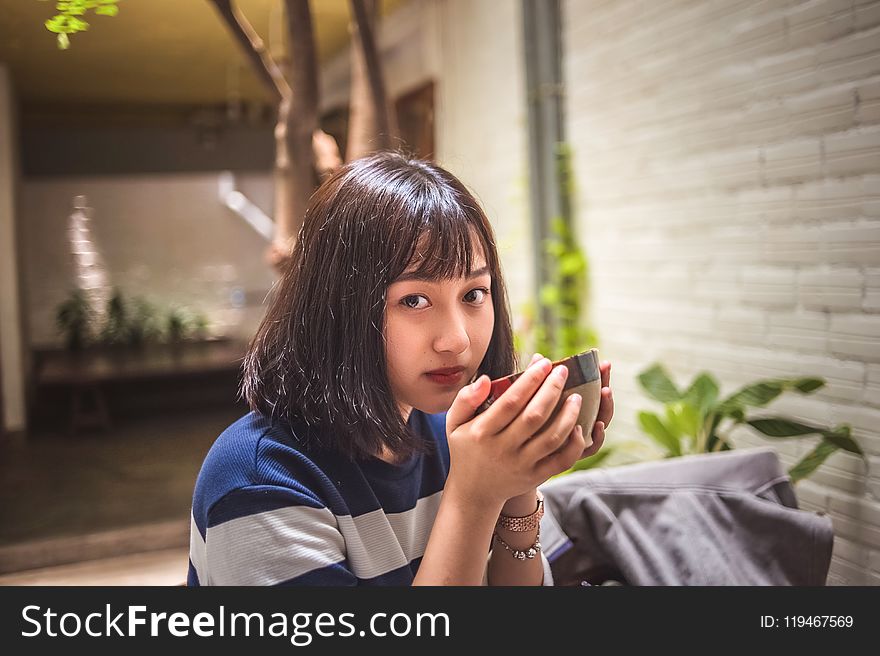 Woman Holding Food Bowl