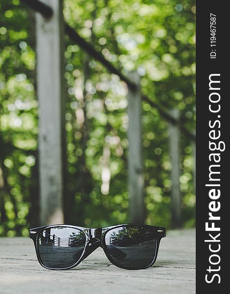 Selective Focus Photography of Black Framed Sunglasses
