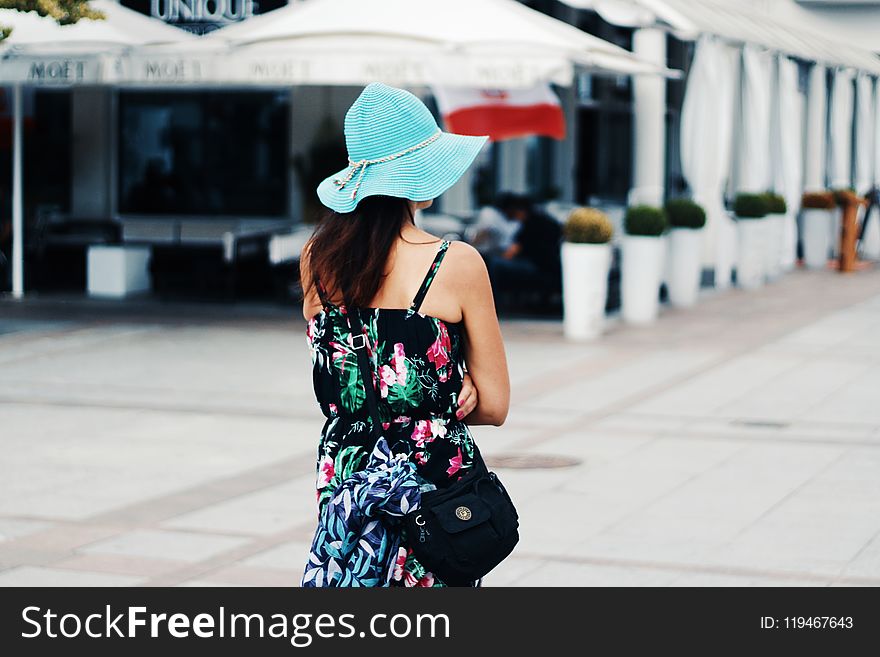 Woman Wearing Multicolored Floral Camisole Dress