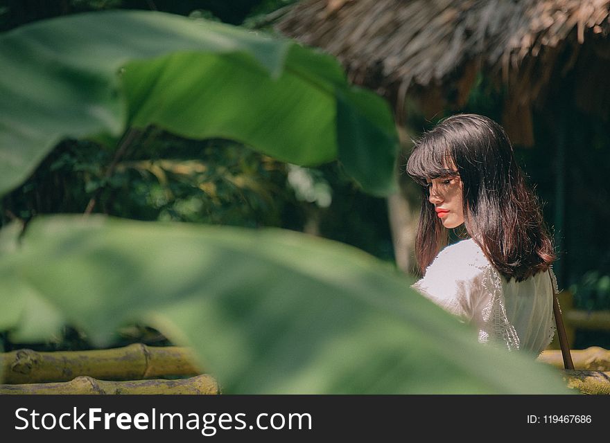 Woman Wearing White Top