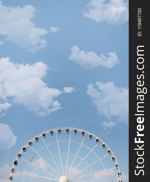White Ferris Wheel Under White Cloudy Blue Sky