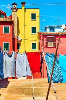 Colorful Houses And Clothes In Burano Royalty Free Stock Photo