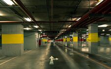 Perspective View Of Empty Indoor Car Parking Lot At The Mall. Underground Concrete Parking Garage With Open Lamp At Night. Stock Images