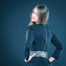Portrait Of Stylish Young Woman In Black Dress Stock Image