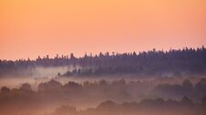 Misty Morning Of Hilly Area With Ray Of Light. Stock Images