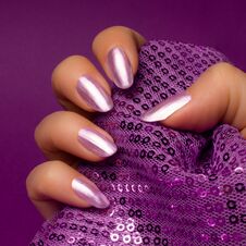 Shiny Purple Nails Manicure Stock Image