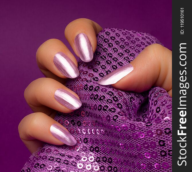 Shiny purple nails manicure